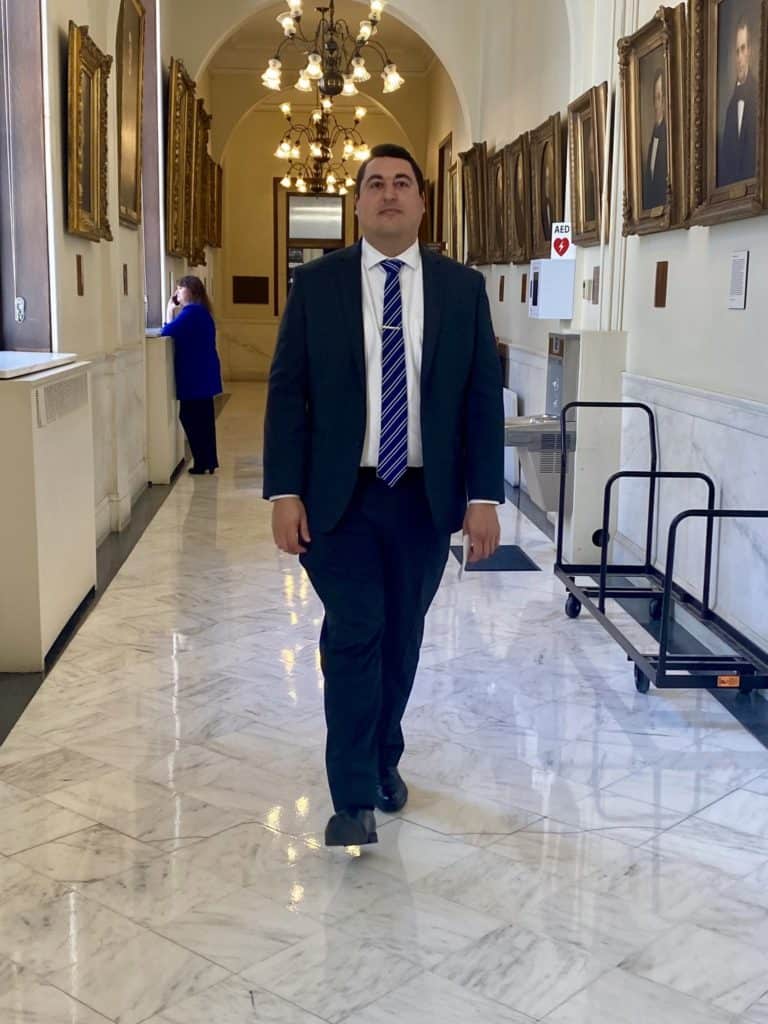 David Jenkins walking through the State House in Concord NH.